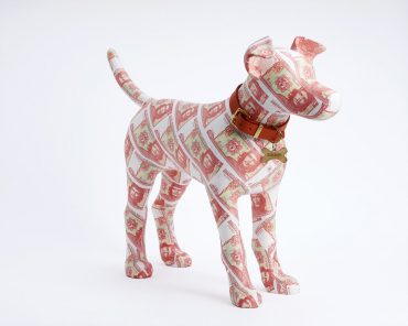 Ernesto - currency covered dog sculpture